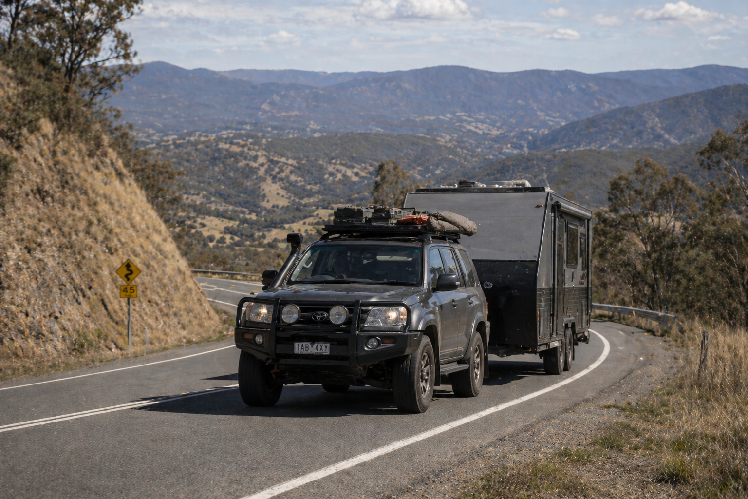 a loaded 4x4 climbing a gradient, or a tow vehicle pulling a trailer on a regional road.