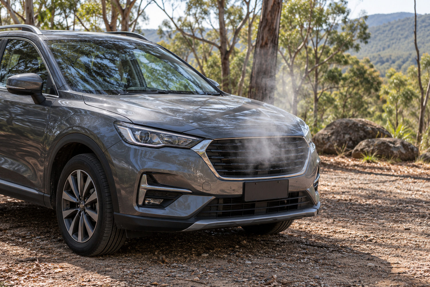 Steam escapes from the closed bonnet area of a stationary SUV in a quiet gravel parking area.